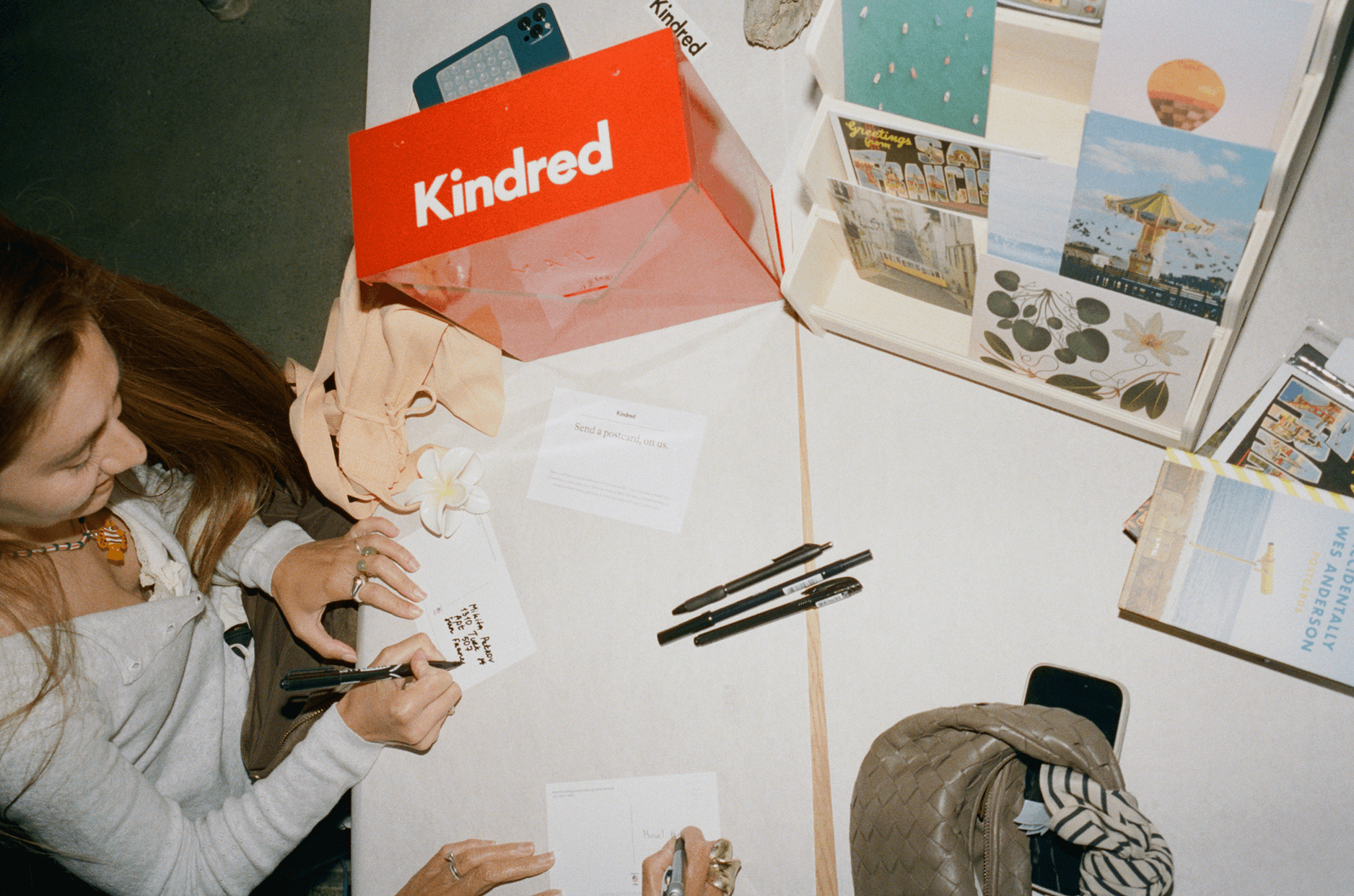 Guests wrote out postcards to friends and potential Kindred members, and we mailed them out.